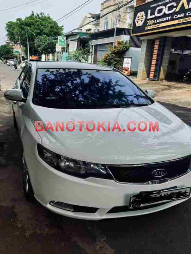 Cần bán gấp xe Kia Forte SX 1.6 MT 2011 màu Trắng