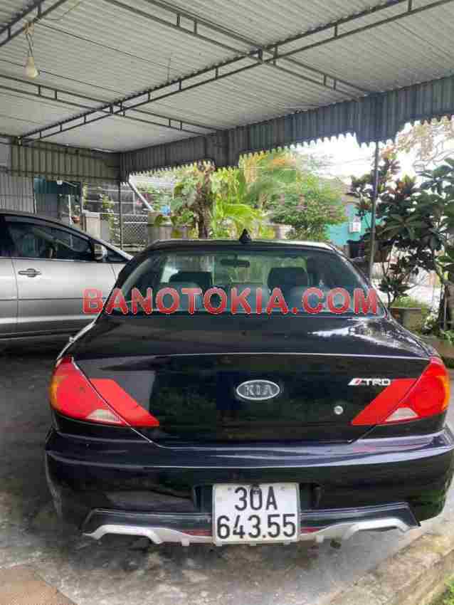 Cần bán gấp xe Kia Spectra 1.6 MT 2003 màu Đen