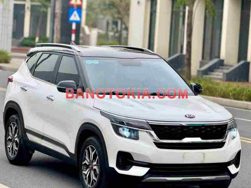 Cần bán gấp Kia Seltos Luxury 1.4 AT đời 2021, màu Trắng