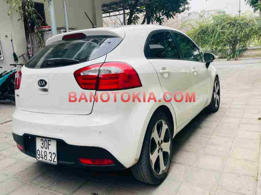 Cần bán gấp xe Kia Rio 1.4 AT 2014 màu Trắng