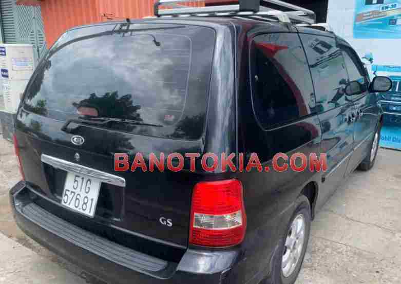 Cần bán gấp Kia Carnival GS 2.5 AT đời 2009, màu Đen