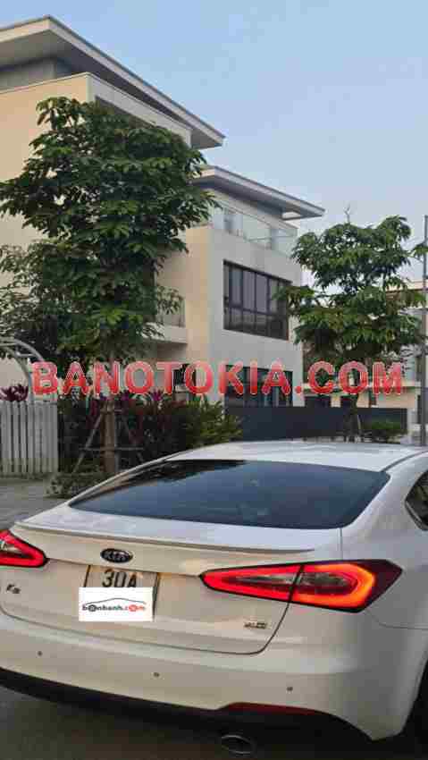 Cần bán xe Kia K3 1.6 AT màu Trắng 2015