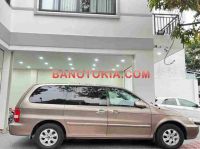 Cần bán gấp xe Kia Carnival GS 2.5 AT năm 2009, màu Nâu, Số tự động