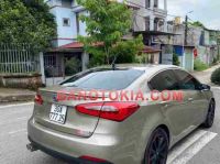 Cần bán xe Kia K3 1.6 AT màu Cát 2015